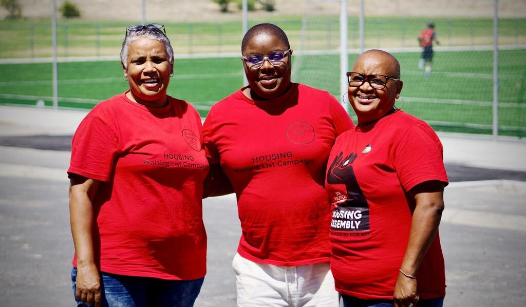 Housing Assembly members at a community gathering